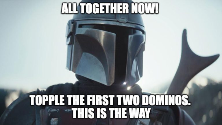 A Close Up meme image of Boba Fett with the text "All Together Now! Topple the first two dominoes. This is the way"